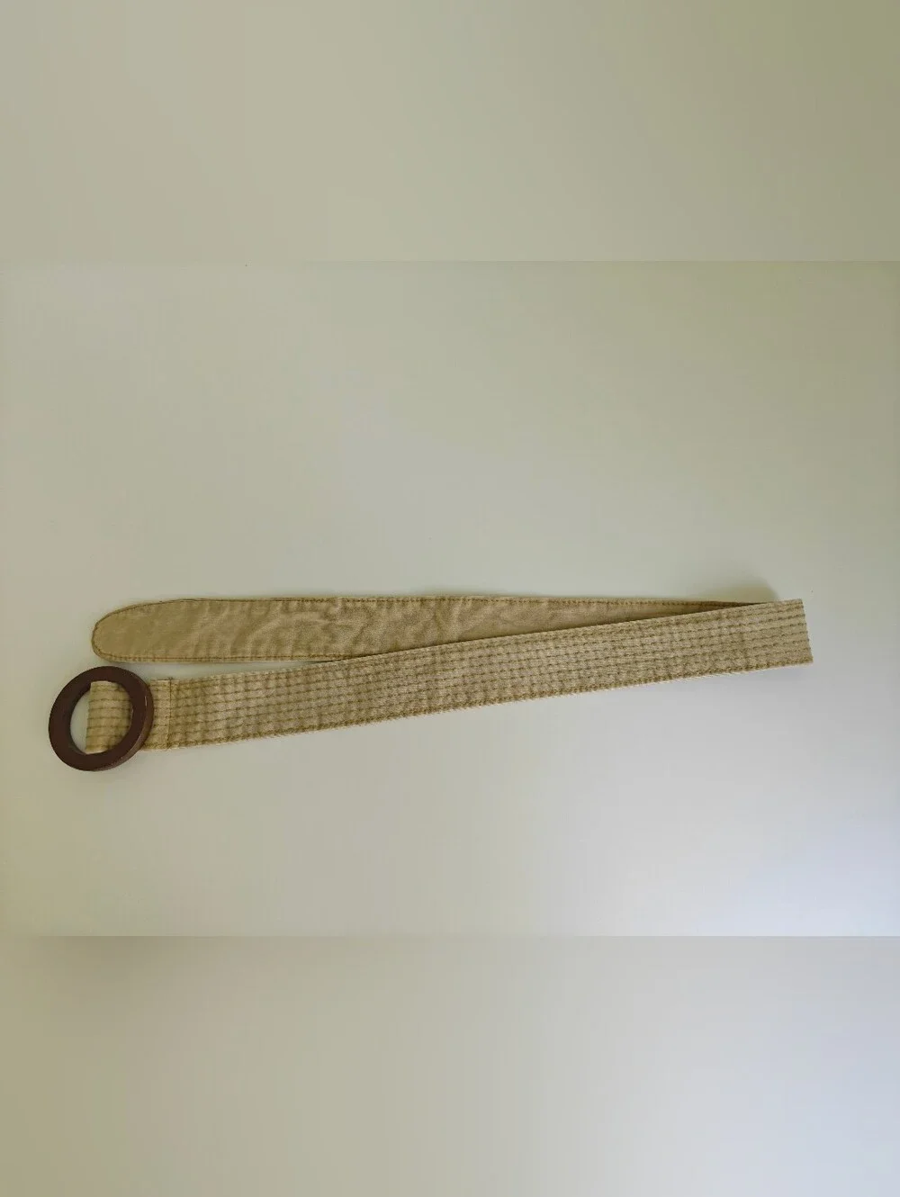 beige canvas stripe boho Y2K belt features dark brown round wooden buckle